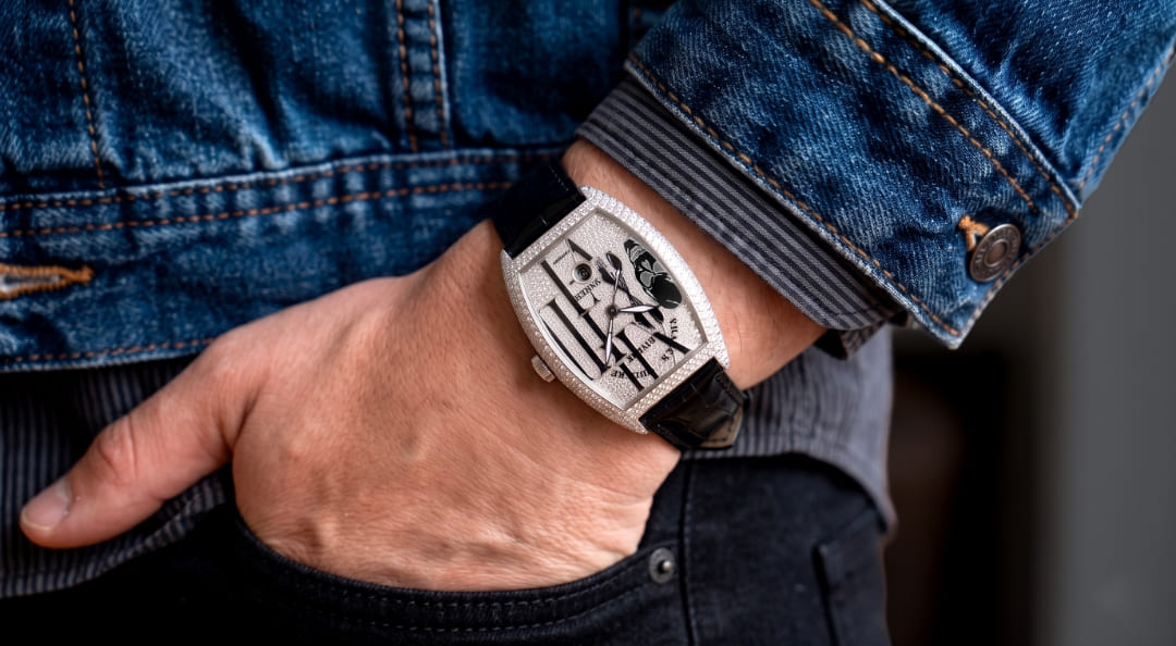 A photo of an arm wearing a Franck Muller Tonneau Curvex Gothic Allongé watch.