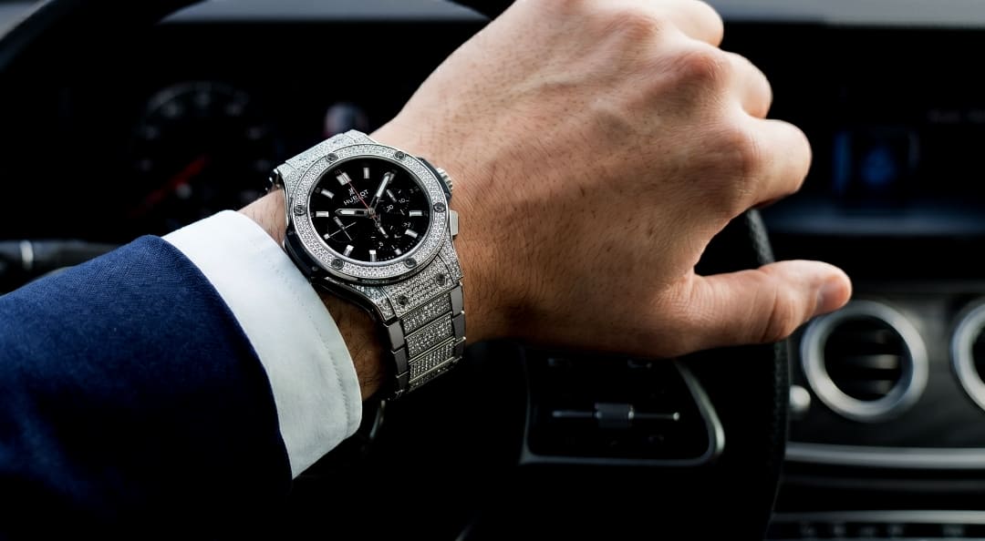 Photo of an arm wearing a Hublot Big Bang Evolution Pavé bracelet.