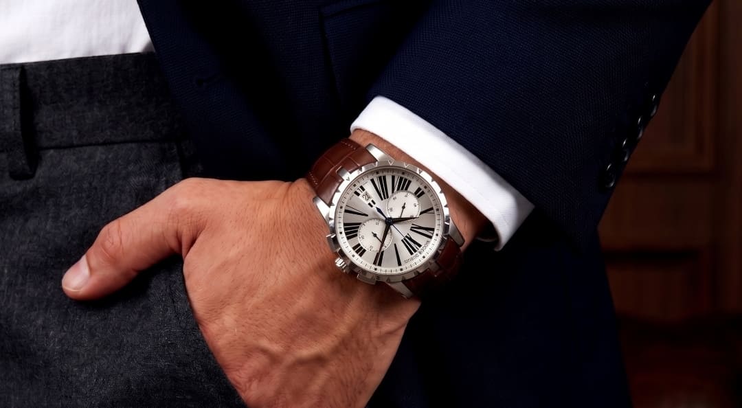 A photograph of a wrist wearing a Roger Dubuis Excalibur 42 Chronograph Automatic.